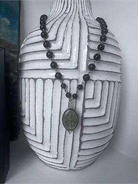 Virgins, Saints and Angels Black Beaded Pendant Necklace with pendant.